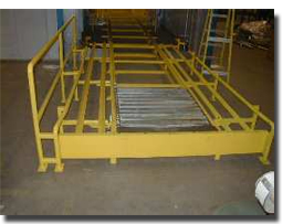 Custom designed pallette conveyor system.